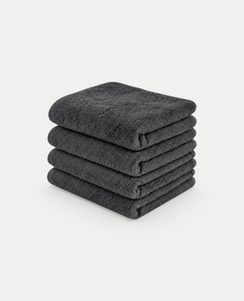 Gästehandtuch Zero-Twist-Baumwolle 30x30 cm (4 Stk.) | Anthrazit Stapel donkergrijze handdoeken met een luxe textuur van DOUXE